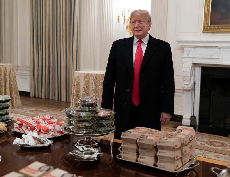 Illustration for article titled This Dude Really Served Clemson Boxed-Up Fast Food On A Bunch Of Fancy Trays